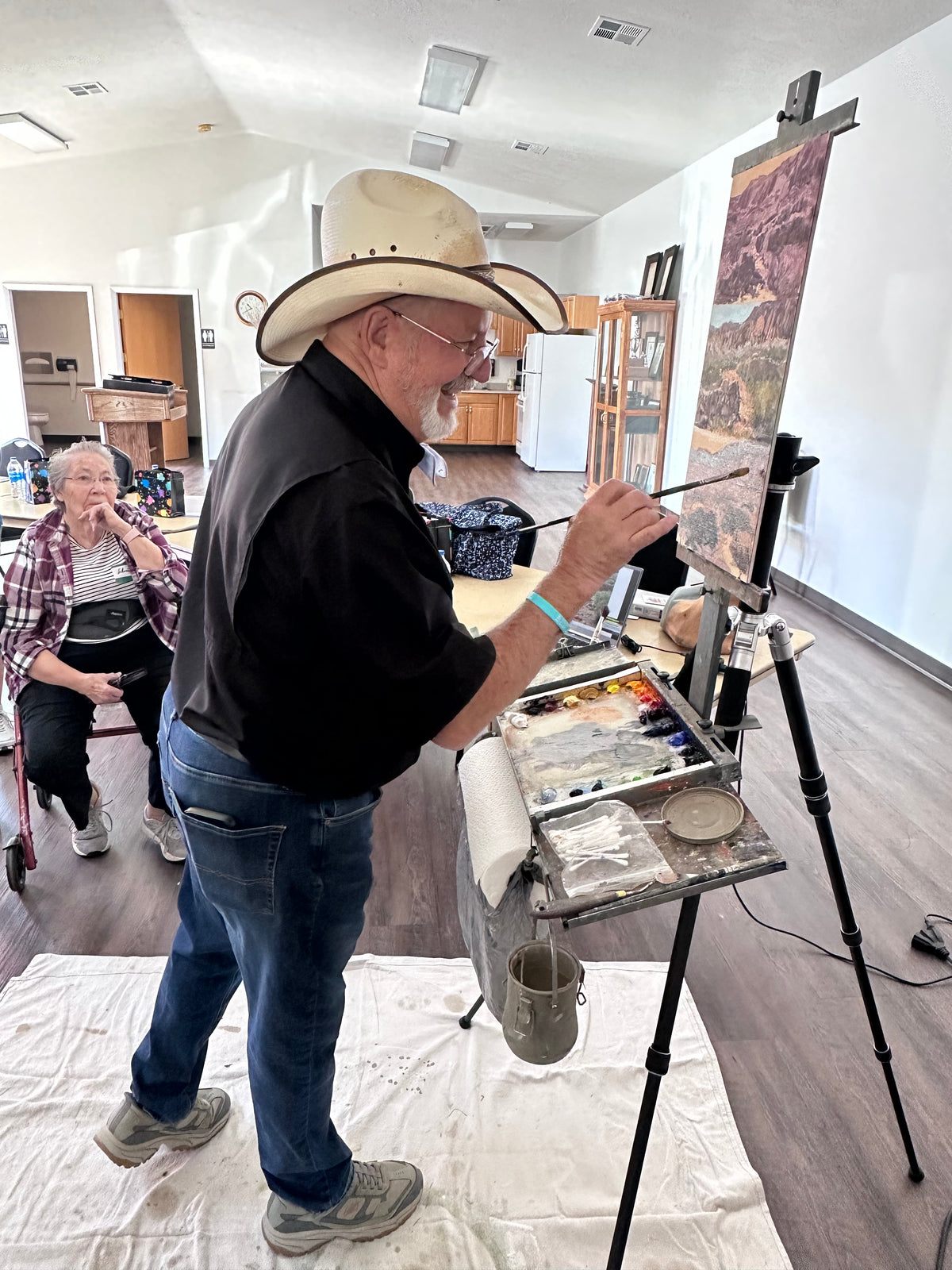 Collectors viewing artwork at an exhibition